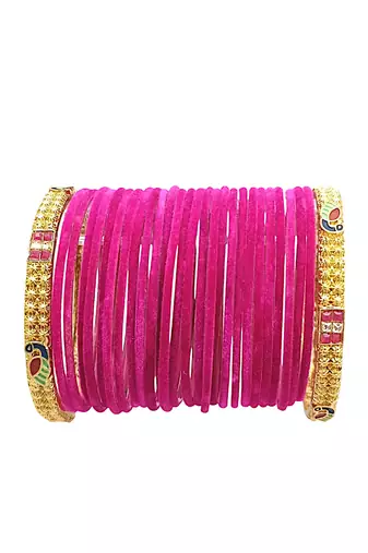 Set of 28 rani and gold plated velvet bangle set