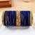 Set of 32 navy blue and gold plated velvet bangle set