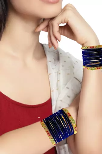 Set of 32 navy blue and gold plated velvet bangle set