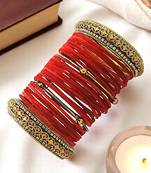 Set of 28 red and gold plated velvet bangle set