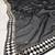Black zari embroidered mirror work organza lehenga choli