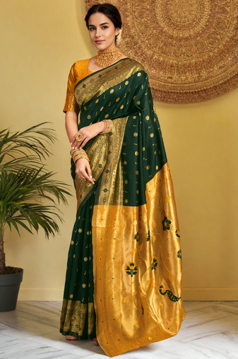Green traditional paithani silk saree with rich zari weaving and contrast border     perfect for wedding wear