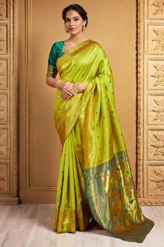 Lime green traditional paithani silk saree with rich zari weaving and contrast border     perfect for wedding wear