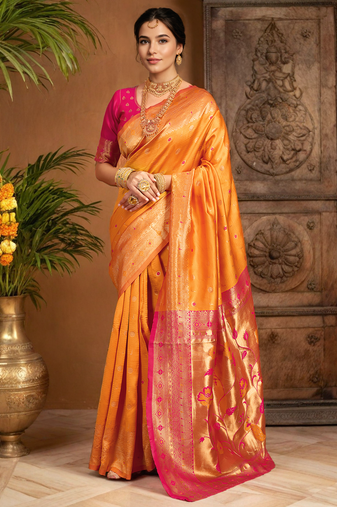 Orange traditional paithani silk saree with rich zari weaving and contrast border – perfect for wedding wear