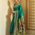 Green traditional paithani silk saree with bird & floral motifs, handwoven weaving work, wedding wear