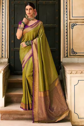 olive green banarasi silk blend saree with intricate zari work with rich brocade patterns