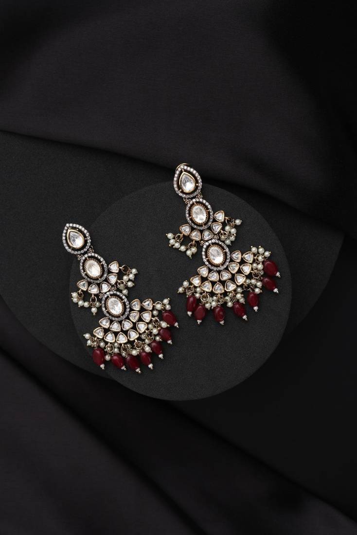 Gold plated red stone kundan jhumkas