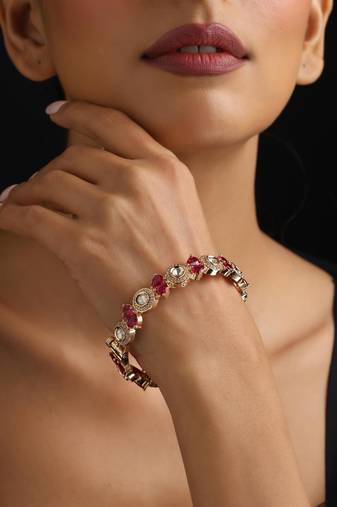 Gold plated red stone kundan bangle