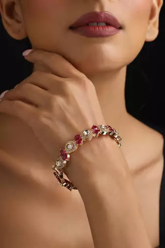 Gold plated red stone kundan bangle