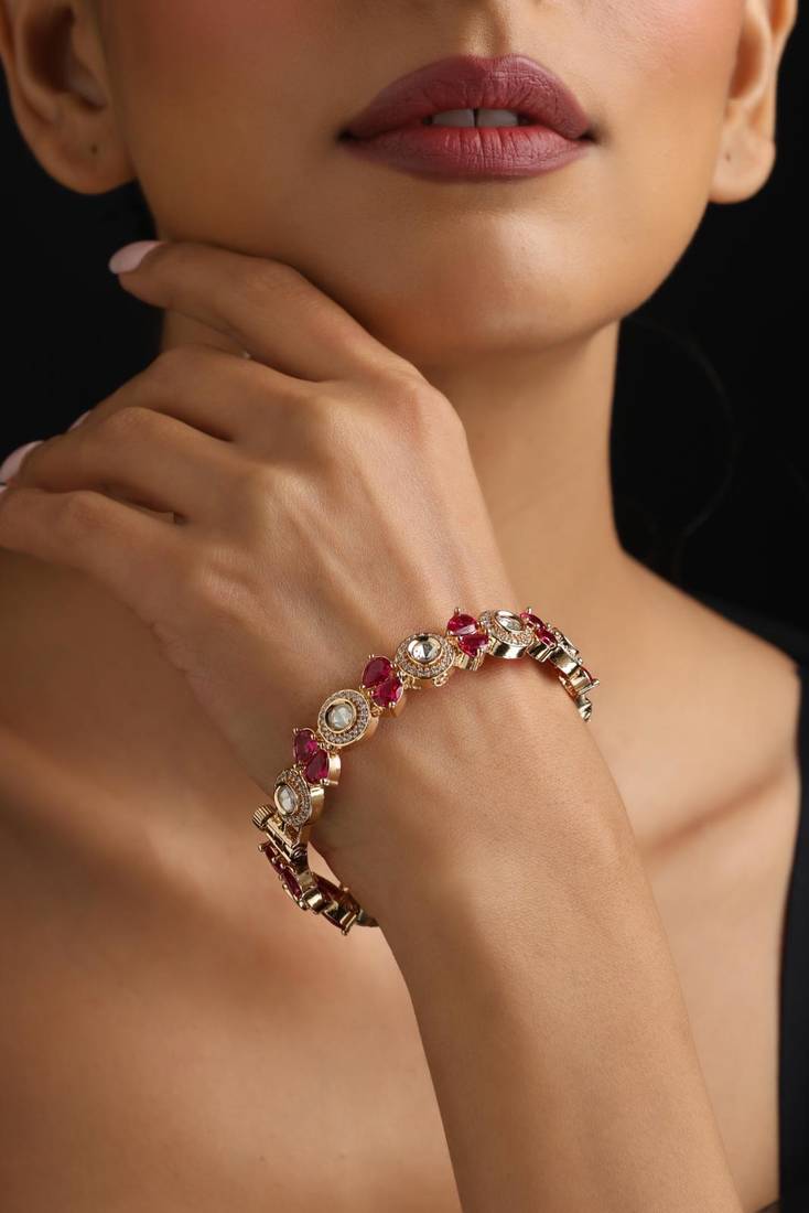 Gold plated red stone kundan bangle