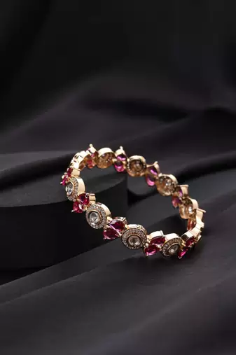 Gold plated red stone kundan bangle