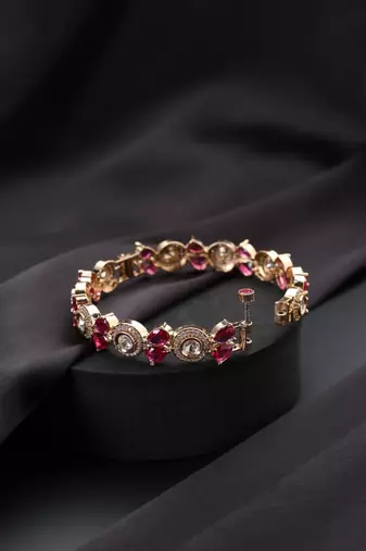 Gold plated red stone kundan bangle