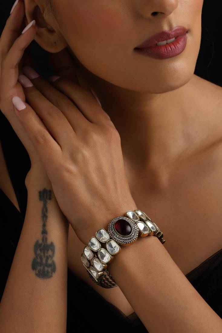Gold plated red stone kundan bangle