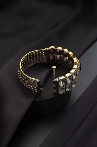 Gold plated red stone kundan bangle