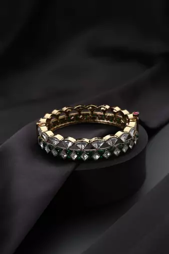 Gold plated green stone kundan bangle