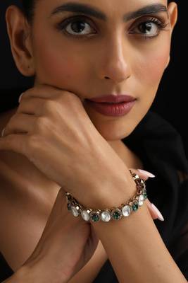 Gold plated green stone kundan bangle 1