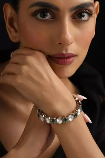 Gold plated green stone kundan bangle