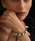 Gold plated green stone kundan bangle