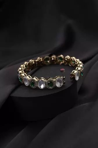 Gold plated green stone kundan bangle