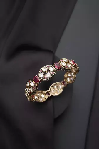 Gold plated red stone kundan bangle