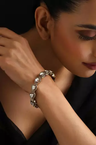 Gold plated kundan bangle