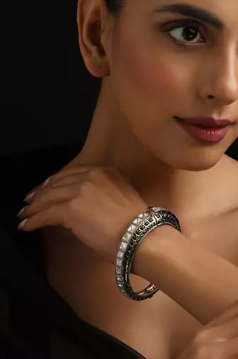 Gold plated green stone kundan bangle