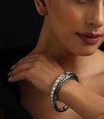 Gold plated green stone kundan bangle