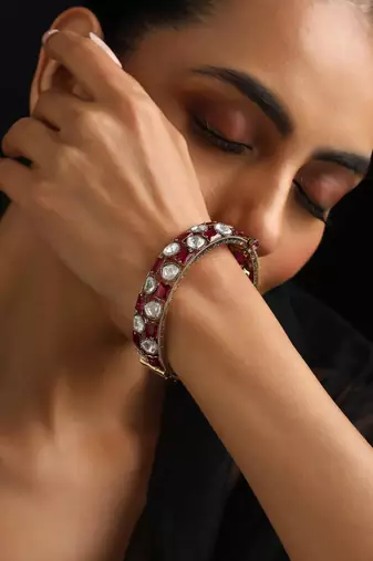Gold plated red stone kundan bangle