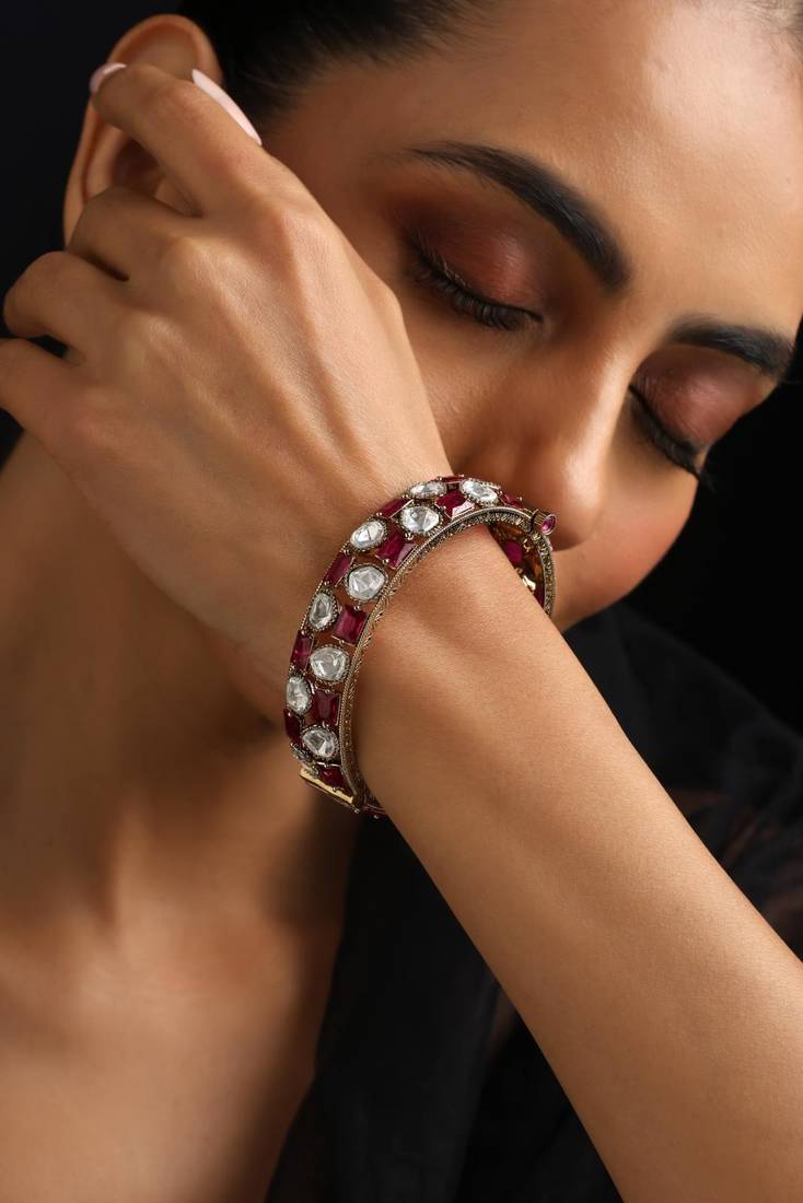 Gold plated red stone kundan bangle