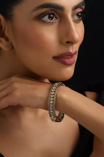 Gold plated kundan bangle