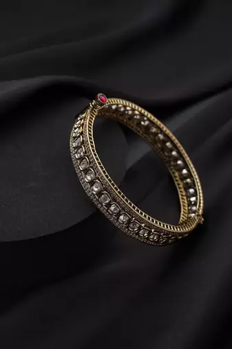 Gold plated kundan bangle