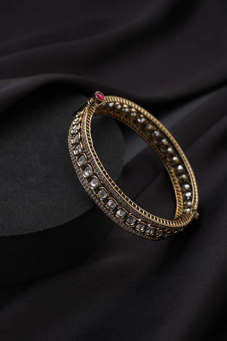 Gold plated kundan bangle