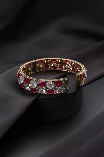 Gold plated red stone kundan bangle