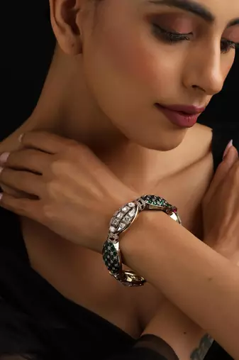 Gold plated green stone kundan bangle