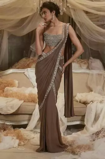 Chocolate brown satin pre draped saree with silver hand embellished kundan work blouse