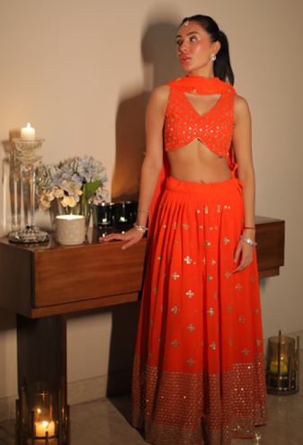 Orange sequined embroidered work georgette fabric wedding lehenga choli with dupatta semi stitched.