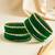 Set of 30 green velvet & gold plated bangles