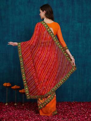 Riva enterprise women's half and half bandhani pallu red  and orange color saree 2