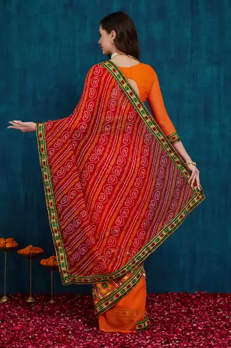 Riva enterprise women's half and half bandhani pallu red  and orange color saree