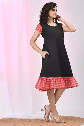 Women's black cotton a-line ethnic dress with red checkered sleeves & ruffle hem