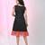 Women's black cotton a-line ethnic dress with red checkered sleeves & ruffle hem