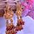 Gold plated red goddess hydra earrings