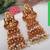 Gold plated white goddess hydra earrings