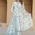 Serene beauty in floral white and blue kurta set