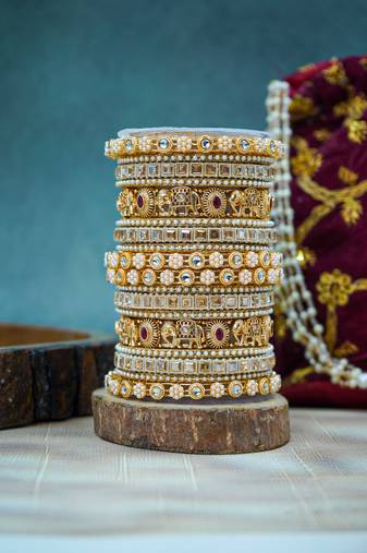 Pearl studded golden metal set