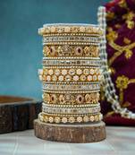 Pearl studded golden metal set