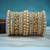 Pearl studded golden metal set