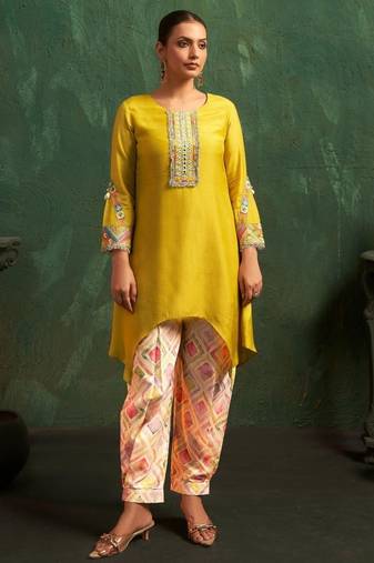 Ira canary light yellow plain blended kurta sets