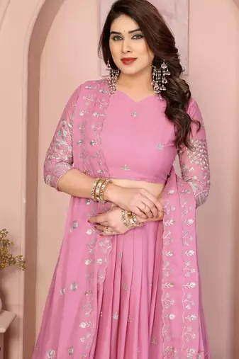 Mesmerizing Baby-pink Sequins and Thread Embroidered Star Georgette indian designer lehenga Choli dress