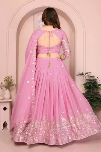 Mesmerizing Baby-pink Sequins and Thread Embroidered Star Georgette indian designer lehenga Choli dress